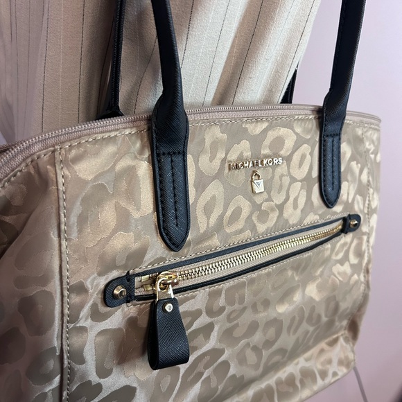 Michael Kors tan and black cheetah print handbag with lots of storage. - Picture 4 of 13